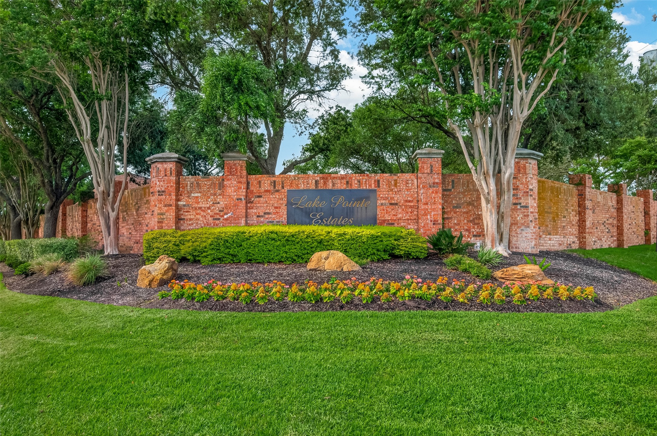 2319 Braer Ridge Drive Katy, TX 77494 - Photo 2 of 50 a view of a garden with a house in the background