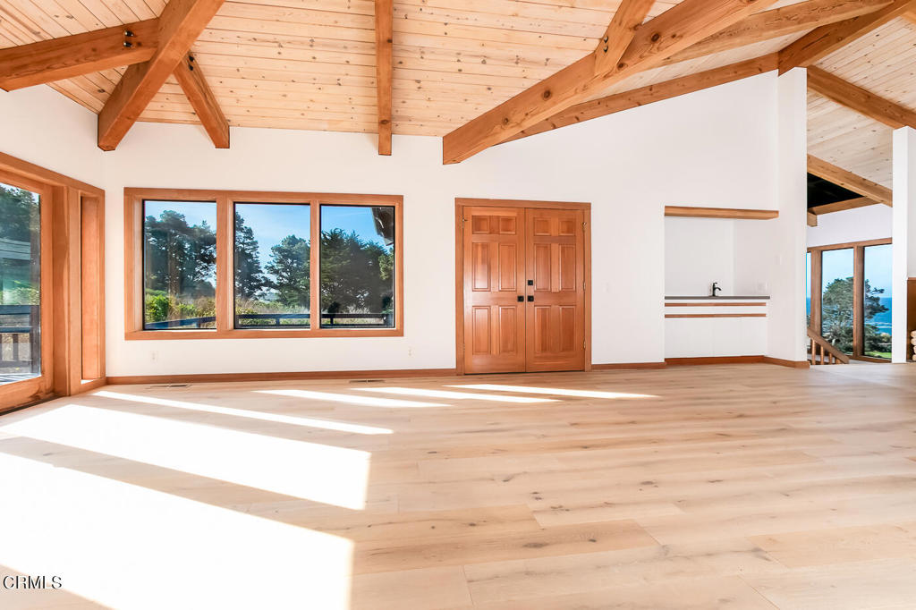 45460 Indian Shoals Road Mendocino, CA 95460 - Photo 15 of 50 a view of an empty room with a window and a ceiling fan