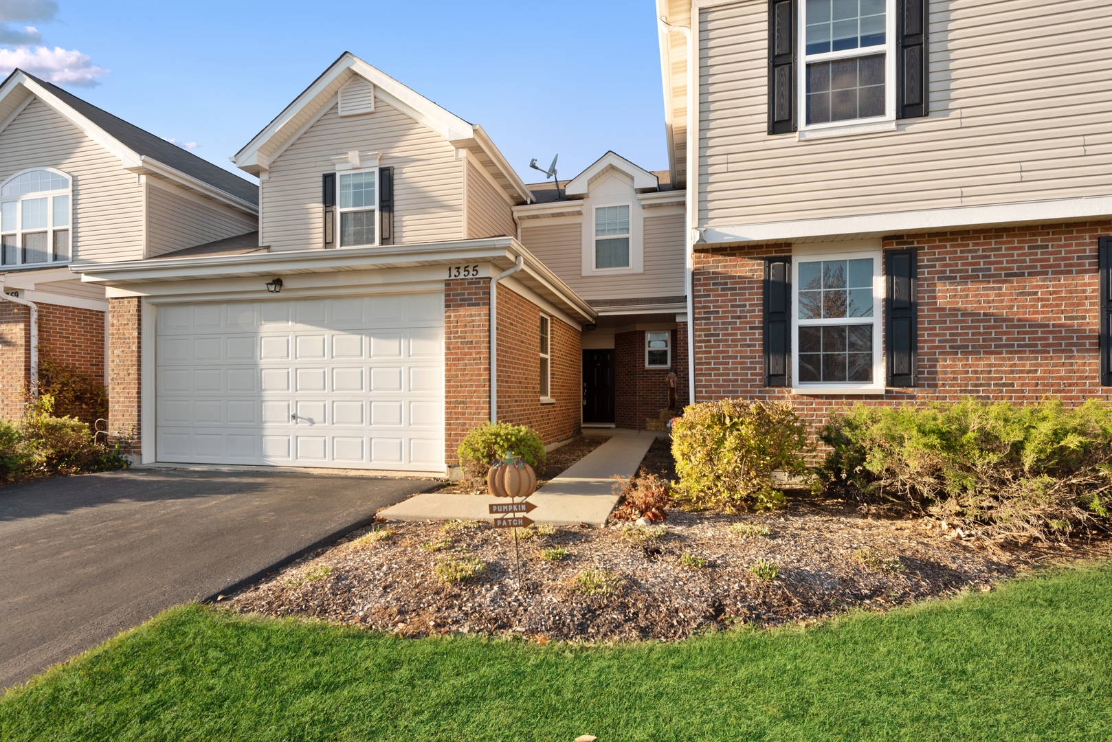 1355 Draper Road McHenry, IL 60050 - Photo 1 of 18 a front view of a house with a yard