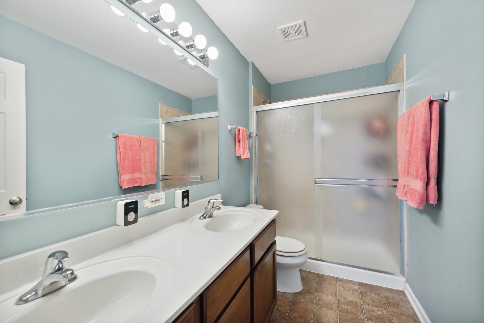 1355 Draper Road McHenry, IL 60050 - Photo 12 of 18 a bathroom with a sink and a mirror
