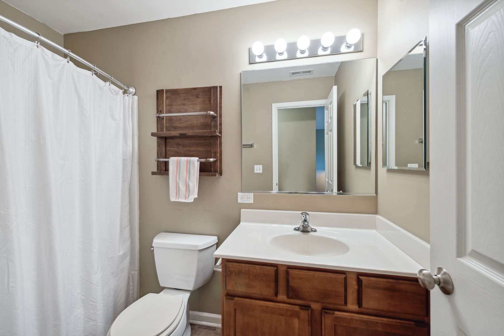 1355 Draper Road McHenry, IL 60050 - Photo 15 of 18 a bathroom with a sink toilet and shower