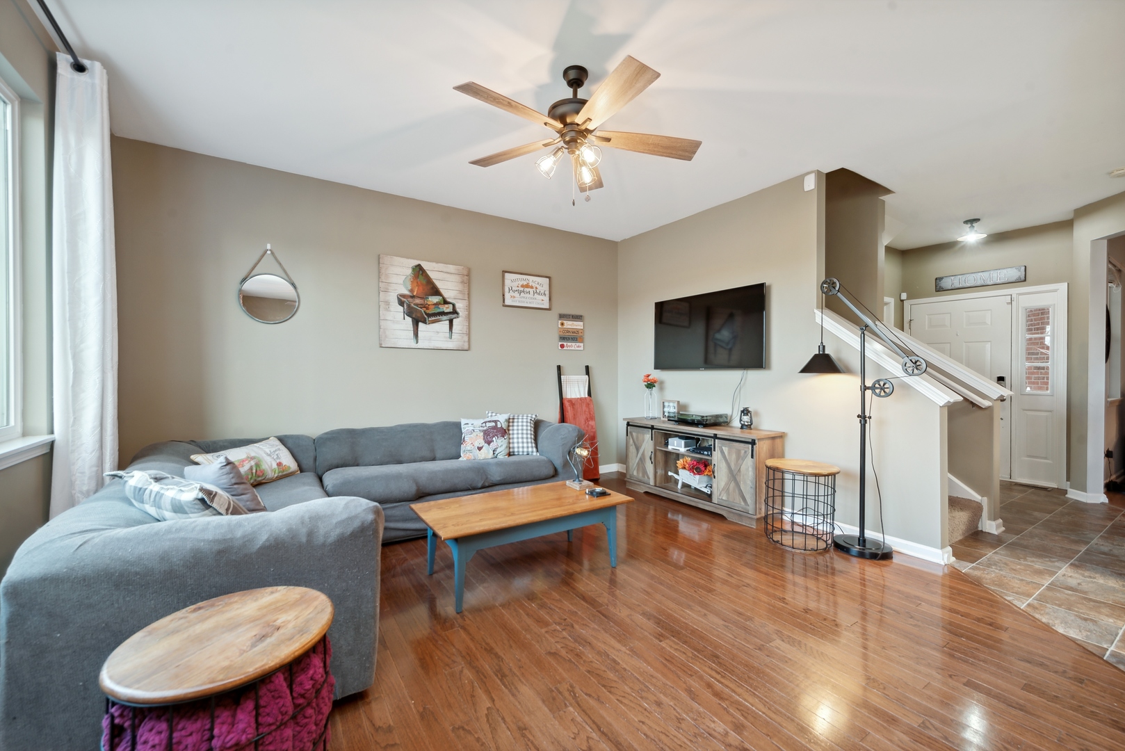 1355 Draper Road McHenry, IL 60050 - Photo 7 of 18 a living room with furniture and a flat screen tv