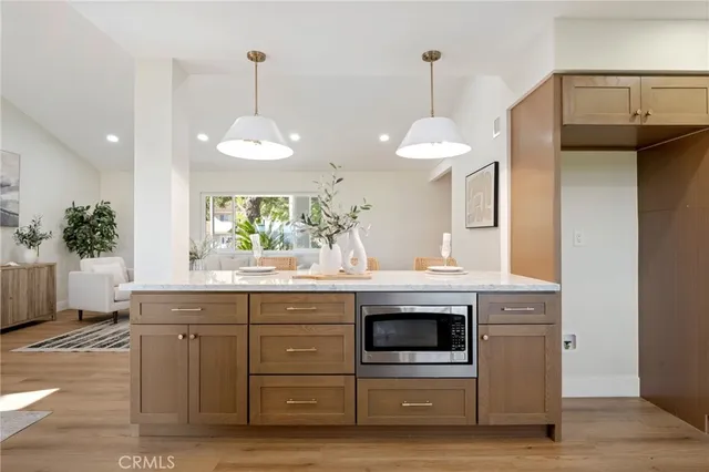 a kitchen with a sink and a stove