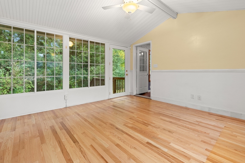 4 Pine Ridge Road Topsfield, MA 01983 - Photo 11 of 40 a view of an empty room with glass door and balcony