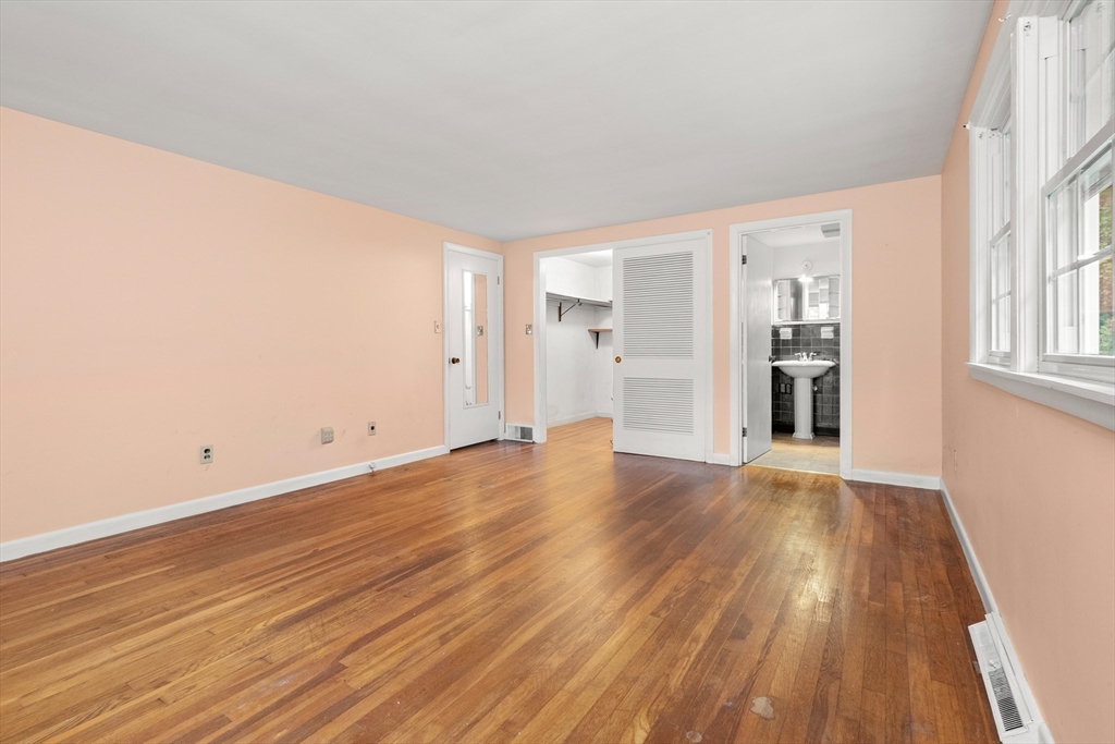 4 Pine Ridge Road Topsfield, MA 01983 - Photo 16 of 40 wooden floor in an empty room with a window