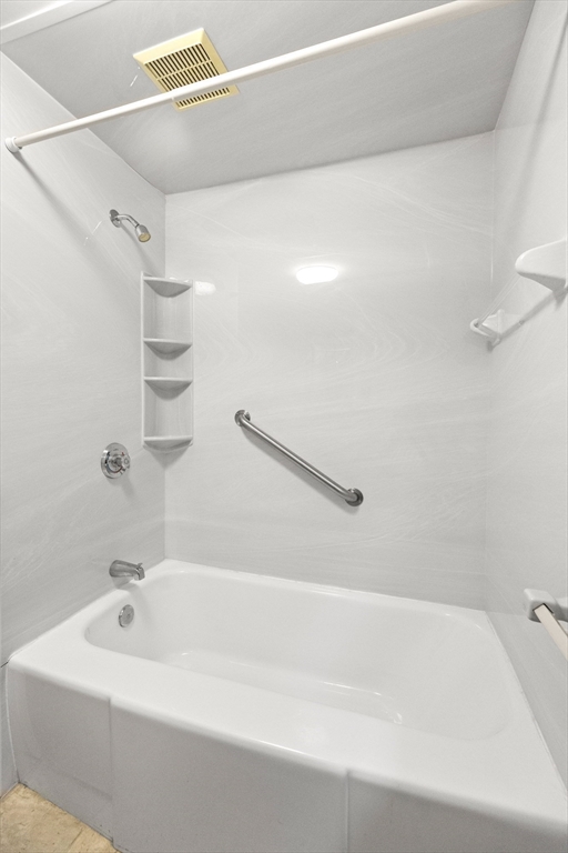 4 Pine Ridge Road Topsfield, MA 01983 - Photo 25 of 40 a bathroom with a bathtub and shower