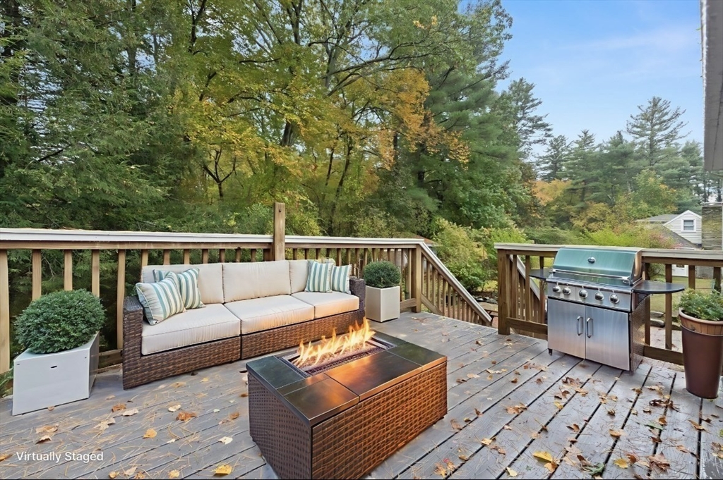 4 Pine Ridge Road Topsfield, MA 01983 - Photo 30 of 40 a roof deck with couches and wooden floor