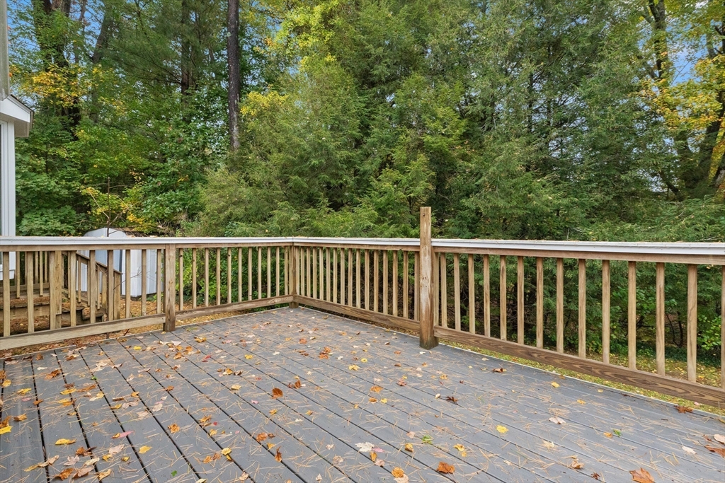 4 Pine Ridge Road Topsfield, MA 01983 - Photo 31 of 40 a view of a wooden roof deck