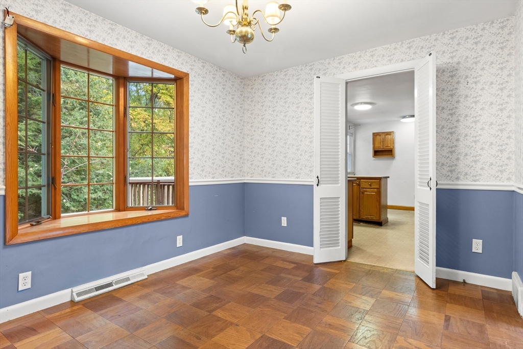 4 Pine Ridge Road Topsfield, MA 01983 - Photo 7 of 40 wooden floor and windows in an empty room