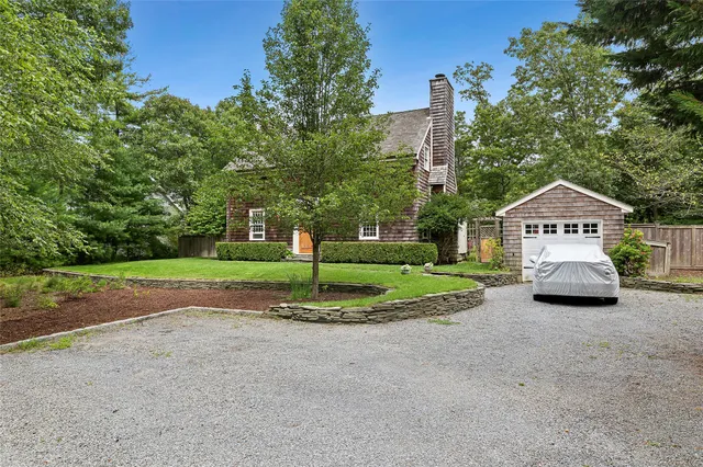 a view of backyard with green space