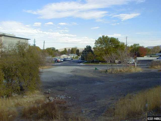 341 Kirman Avenue Reno, NV 89502 - Photo 3 of 4 a view of dirt road with a building in the background