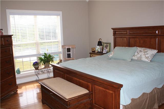 34460 Ardmore Ridge Road Prospect, TN 38477 - Photo 14 of 20 Master Bedroom - With double trey ceiling, extensive moldings and hardwood flooring.