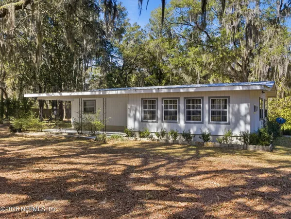 front view of house with a yard