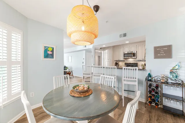 a view of a dining room with furniture