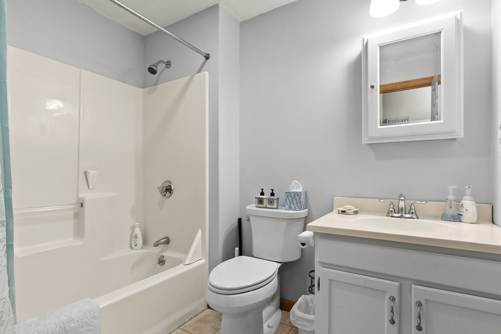 41 Sconset Circle Sandwich, MA 02563 - Photo 11 of 38 a bathroom with a sink toilet and bathtub