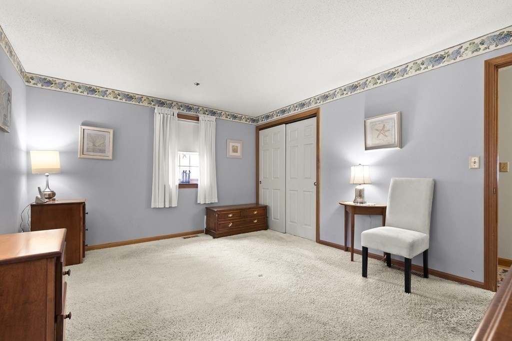 41 Sconset Circle Sandwich, MA 02563 - Photo 12 of 38 a livingroom with furniture and a window