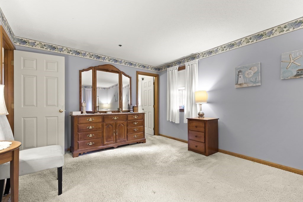 41 Sconset Circle Sandwich, MA 02563 - Photo 13 of 38 a room with furniture and mirror