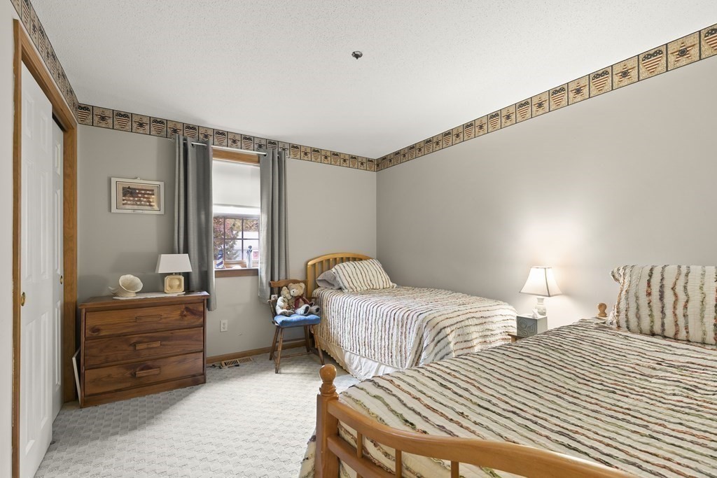 41 Sconset Circle Sandwich, MA 02563 - Photo 20 of 38 a bedroom with a bed and a window