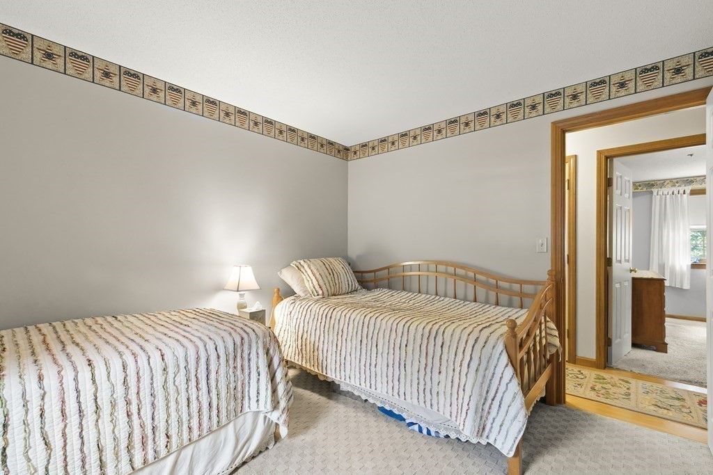 41 Sconset Circle Sandwich, MA 02563 - Photo 21 of 38 a bedroom with a bed and a window