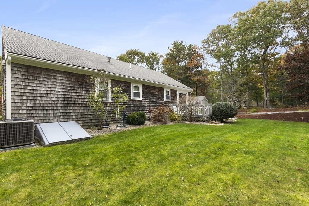41 Sconset Circle Sandwich, MA 02563 - Photo 28 of 38 a view of a house with backyard and garden