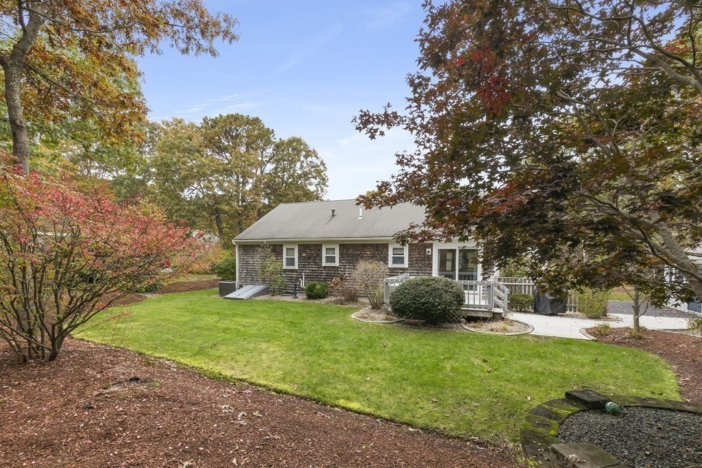 41 Sconset Circle Sandwich, MA 02563 - Photo 30 of 38 a front view of a house with a garden