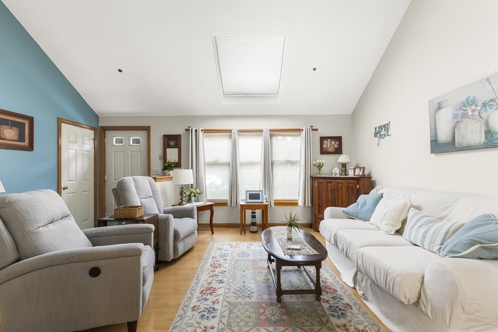 41 Sconset Circle Sandwich, MA 02563 - Photo 4 of 38 a living room with furniture or couch and a large window
