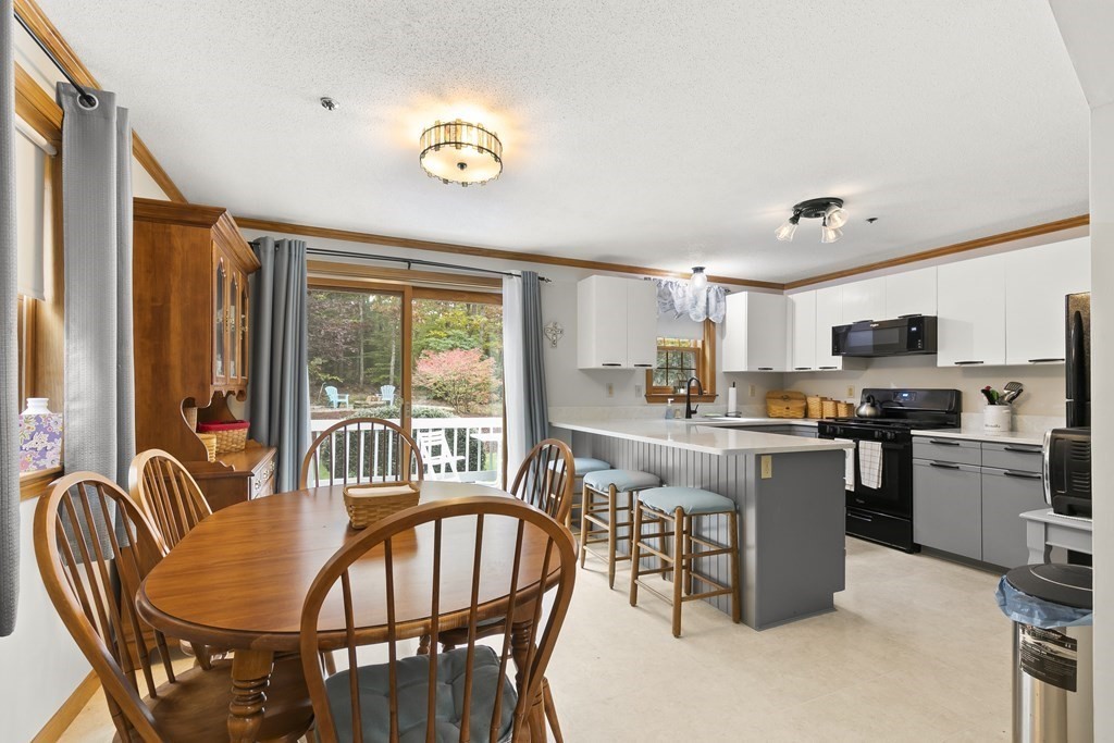 41 Sconset Circle Sandwich, MA 02563 - Photo 7 of 38 a view of a dining room with furniture window and outside view