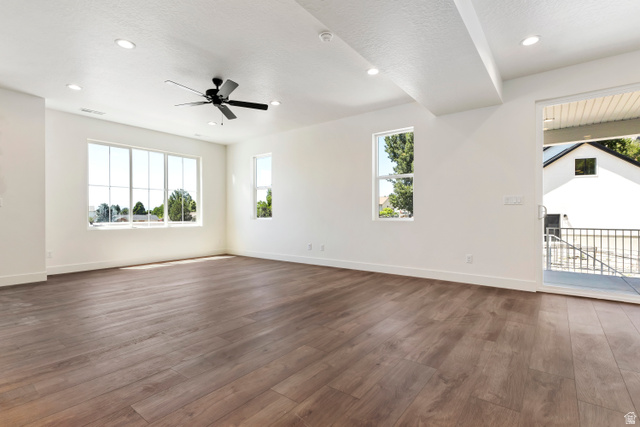 504 North 650 E Street Springville, UT 84663 - Photo 11 of 36 Spacious room featuring wood-finish flooring, recessed lighting, and a black ceiling fan