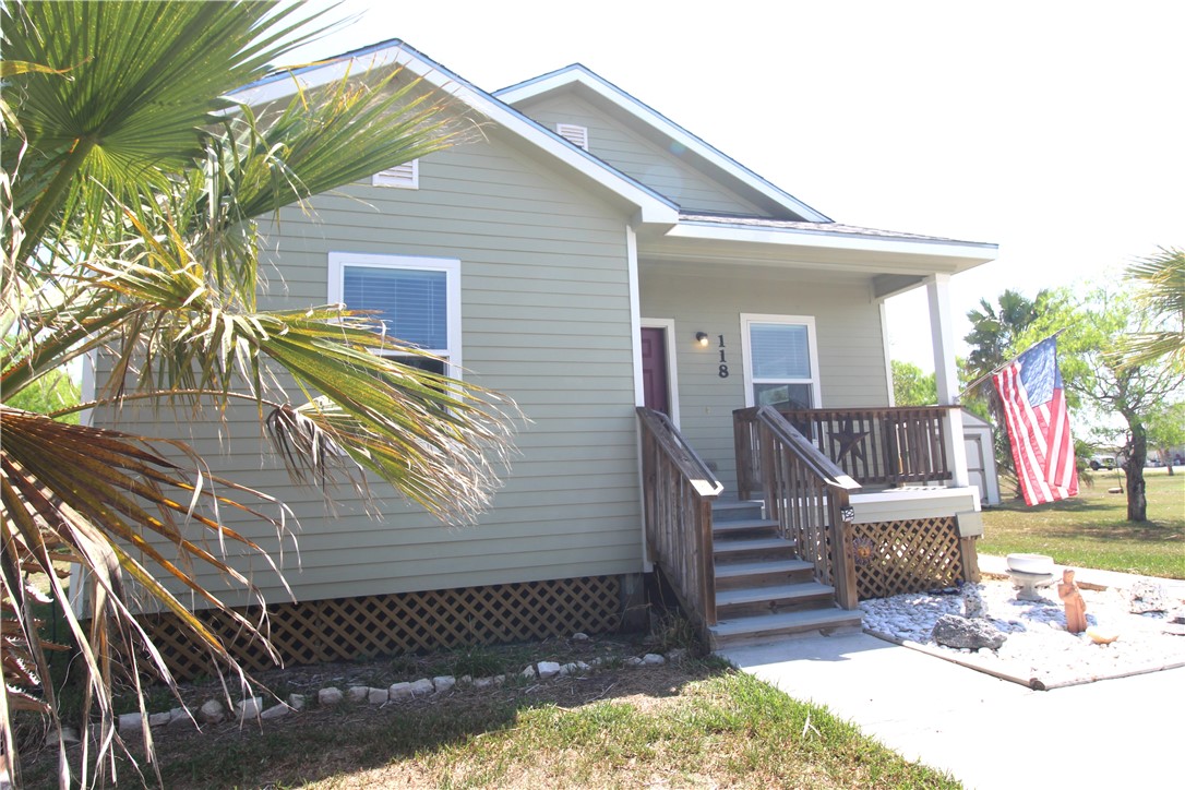 118 Salt Lake Road Rockport, TX 78382 - Photo 4 of 34 a view of a house with a yard