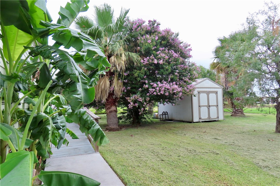 118 Salt Lake Road Rockport, TX 78382 - Photo 6 of 34 a view of a house with a garden
