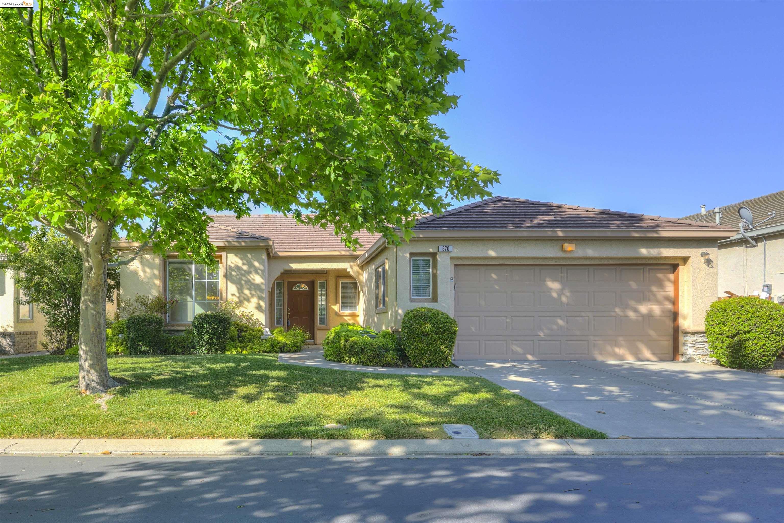 670 Turnberry Terrace Rio Vista, CA 94571 - Photo 1 of 1 a front view of a house with garden