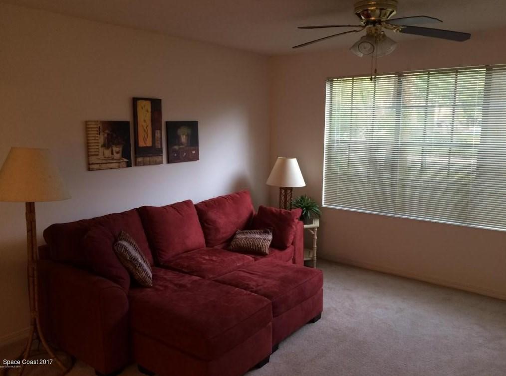 7667 North Wickham Road, Unit 505 Melbourne, FL 32940 - Photo 7 of 25 Living Room 2