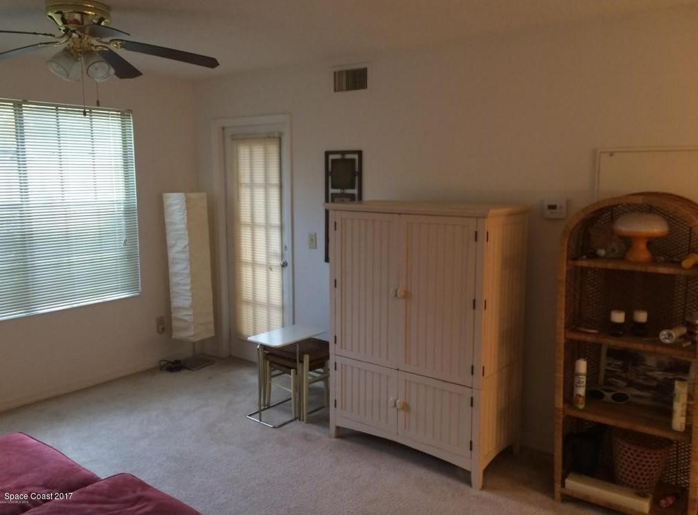 7667 North Wickham Road, Unit 505 Melbourne, FL 32940 - Photo 9 of 25 Living Room 4