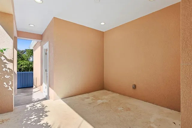 a front view of a house with a yard and a garage