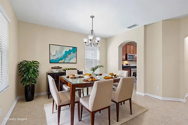 an empty room with windows and entrance