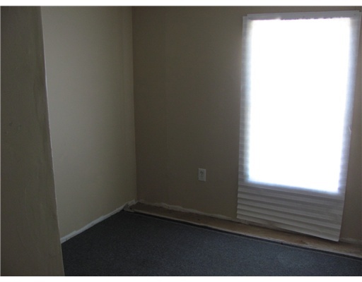 6021 Skyline Drive Corpus Christi, TX 78408 - Photo 6 of 9 a view of an empty room and wooden floor