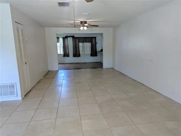a view of a livingroom and window