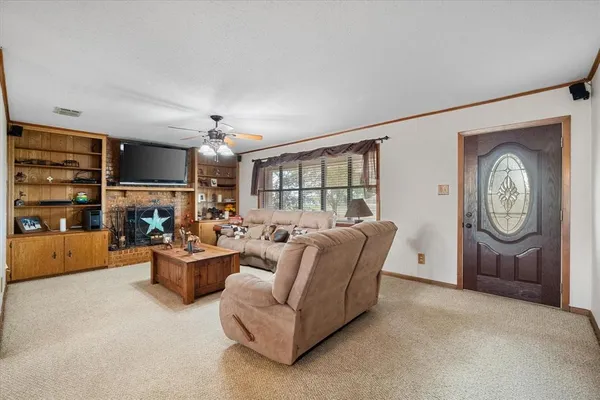 a kitchen with a sink cabinets and window