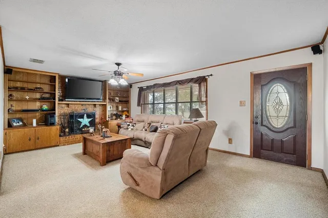 a kitchen with a sink cabinets and window
