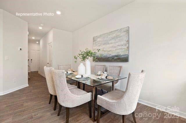 1324 Equestrian Lane York, SC 29745 - Photo 4 of 15 a dining room with furniture and wooden floor
