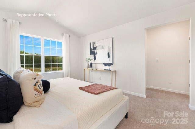 1324 Equestrian Lane York, SC 29745 - Photo 9 of 15 a bedroom with a bed and wooden floor