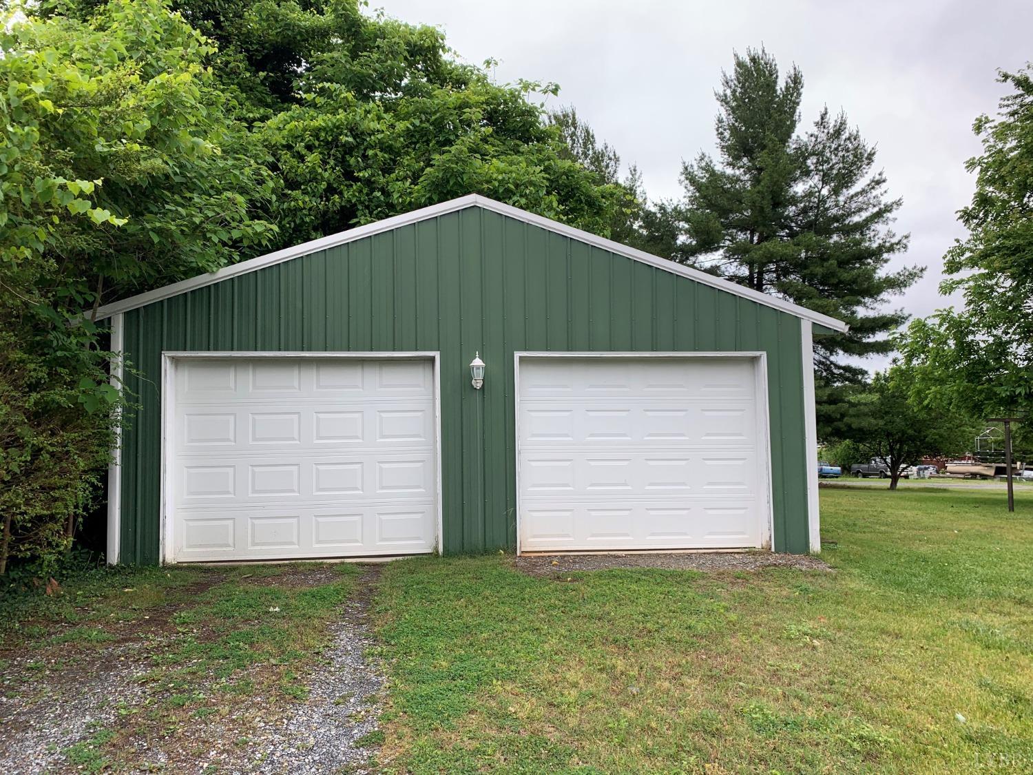 606 Jeter Street Bedford, VA 24523 - Photo 14 of 15 a front view of a house with a garden