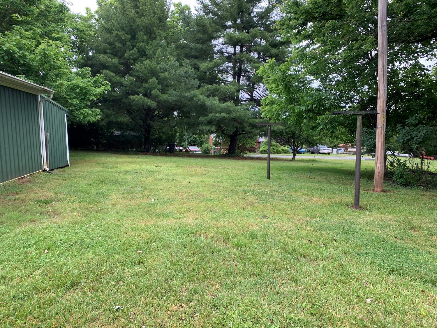 606 Jeter Street Bedford, VA 24523 - Photo 15 of 15 a backyard of a house with lots of green space