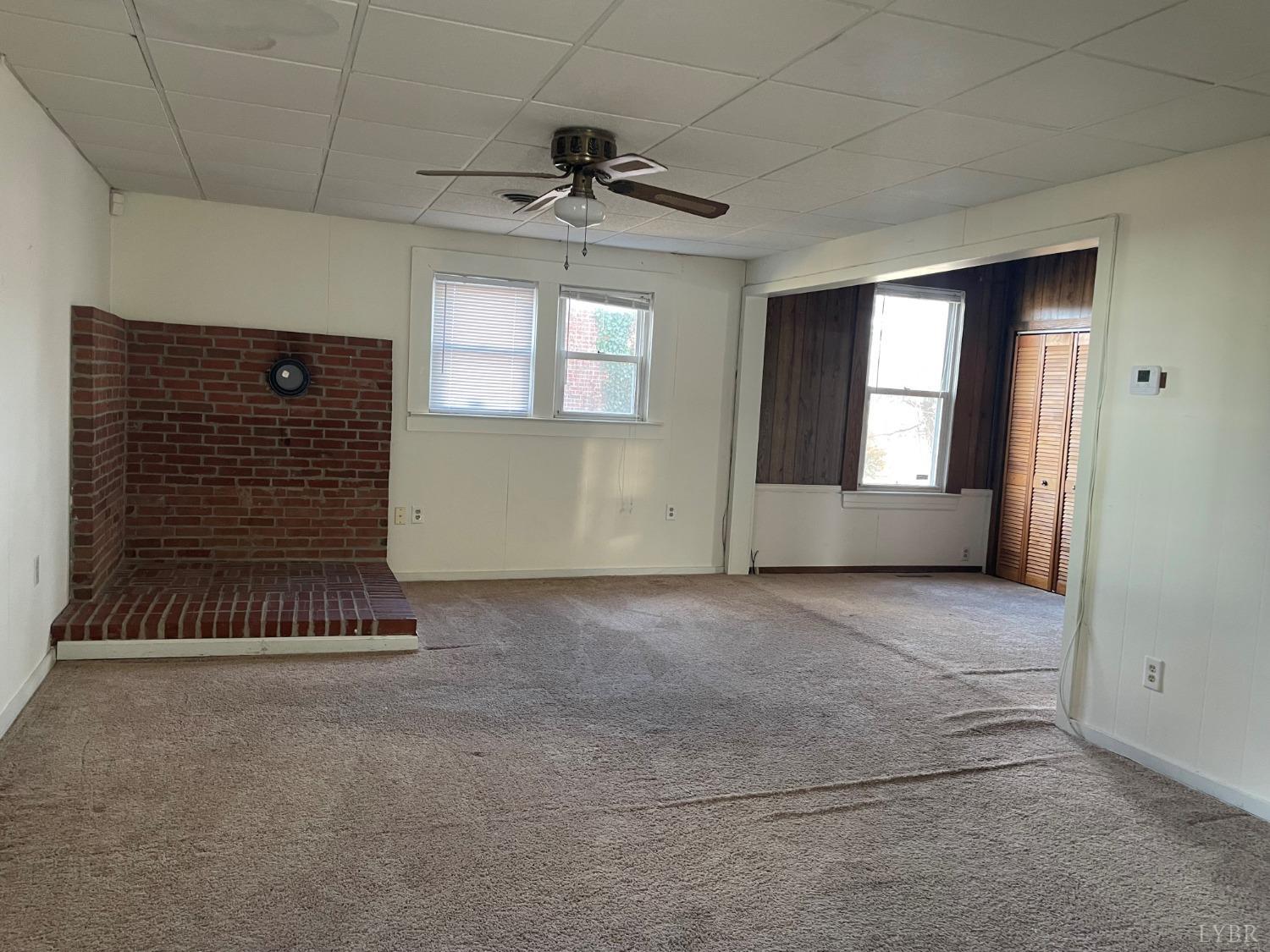 606 Jeter Street Bedford, VA 24523 - Photo 4 of 15 a view of an empty room with a window