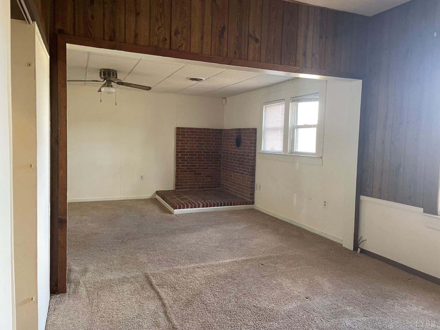 606 Jeter Street Bedford, VA 24523 - Photo 7 of 15 an empty room with windows