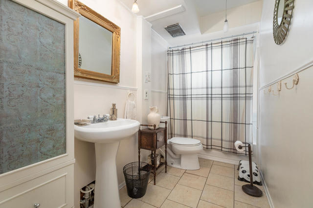 1111 Simons Road Oswego, IL 60543 - Photo 17 of 37 a bathroom with a sink toilet and shower