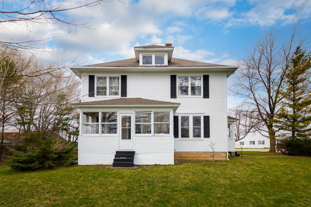 1111 Simons Road Oswego, IL 60543 - Photo 2 of 37 a front view of a house with a yard