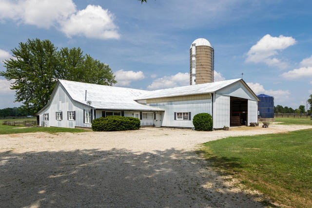 1111 Simons Road Oswego, IL 60543 - Photo 24 of 37 a front view of a house with a yard and garage