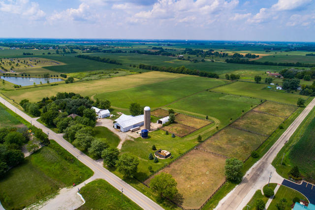 1111 Simons Road Oswego, IL 60543 - Photo 27 of 37 a view of a lake with a yard