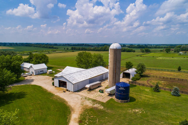 1111 Simons Road Oswego, IL 60543 - Photo 31 of 37 a view of a lake with a mountain in the background